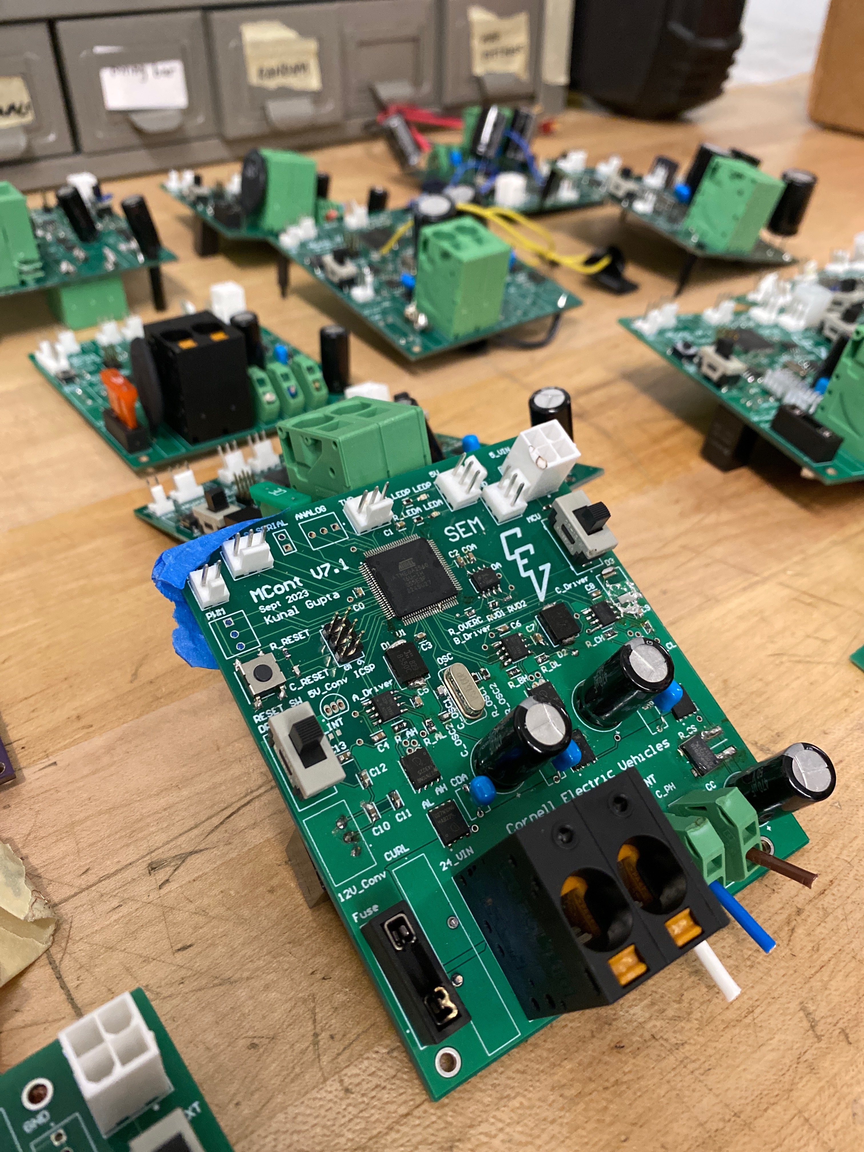 Cornell Electric Vehicles controller boards on a workbench