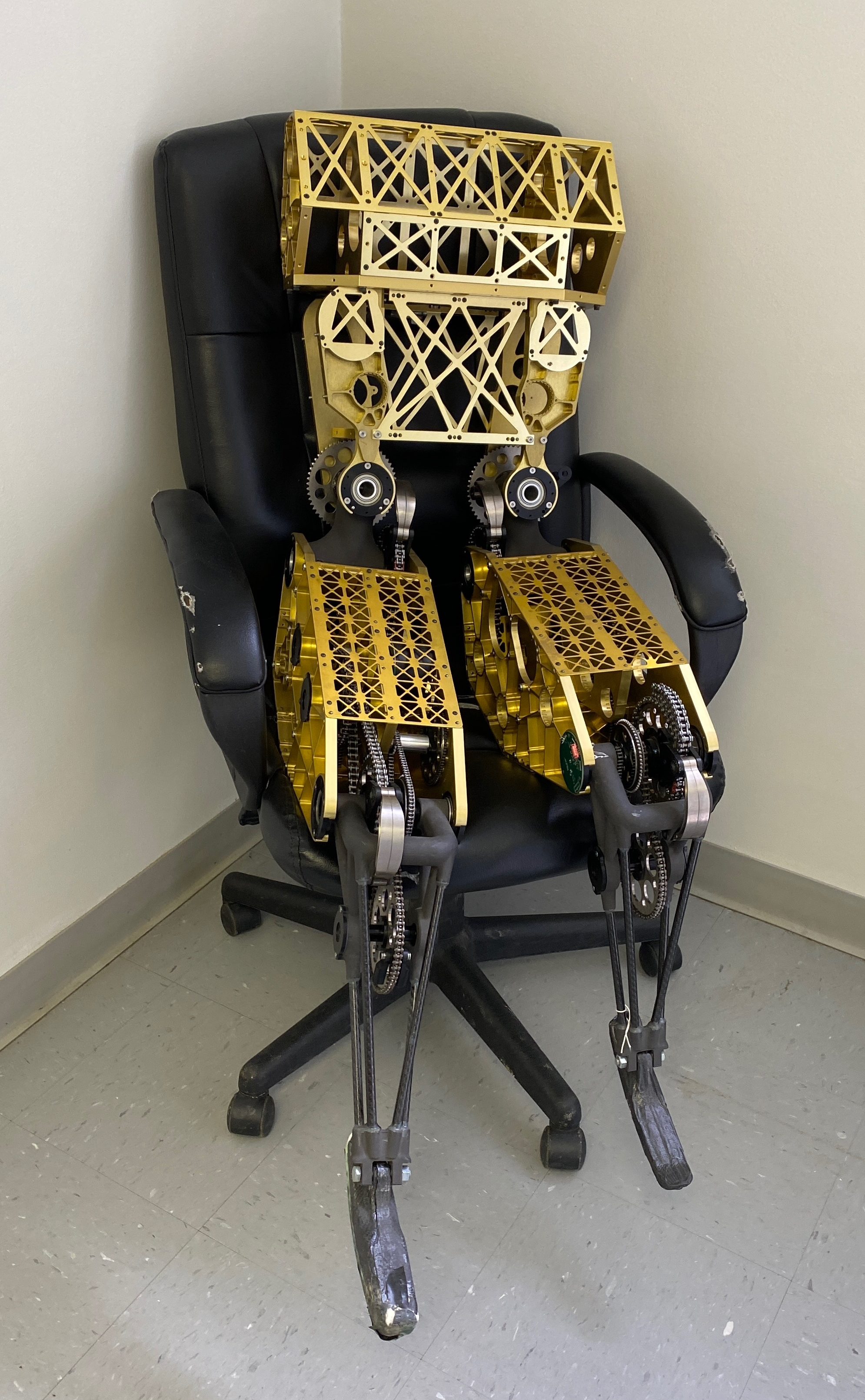 Humanoid robot prototype with exposed leg-joint assemblies