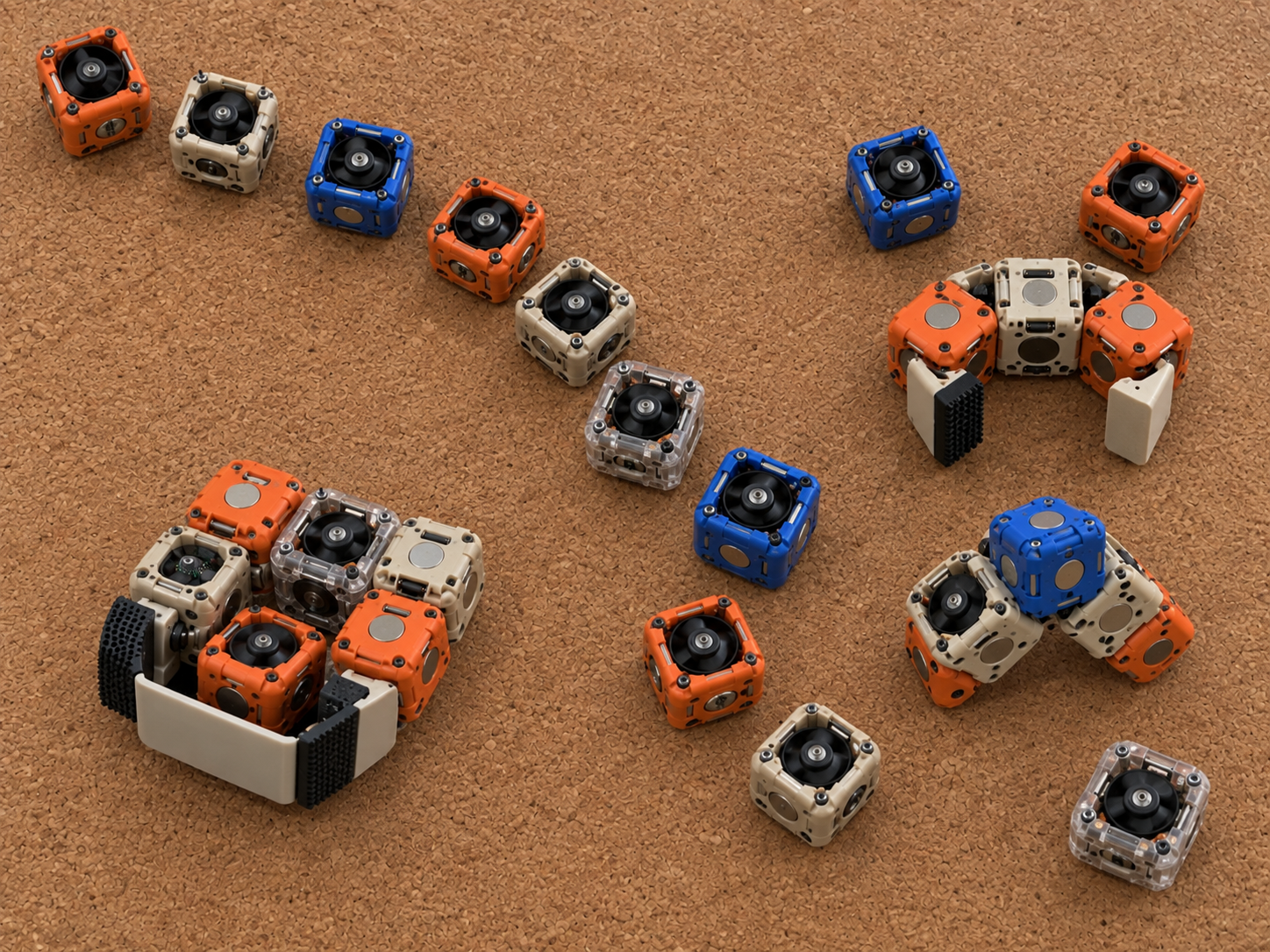Magnetic cube prototypes forming early gripper and structural arrangements